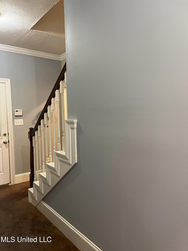 140 Whisper Lake Blvd, Madison, MS 39110 - staircase with ornamental molding, a textured ceiling, and baseboards
