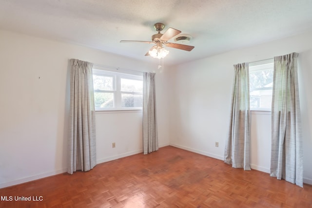 820 Lackland Dr, Biloxi, MS 39532 - spare room with plenty of natural light, a ceiling fan, and baseboards