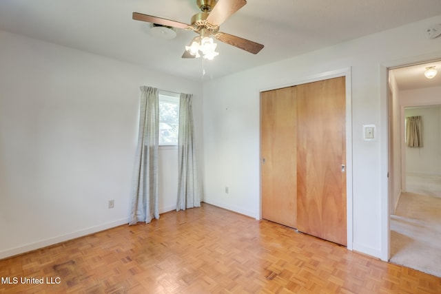 820 Lackland Dr, Biloxi, MS 39532 - unfurnished bedroom featuring baseboards and a ceiling fan