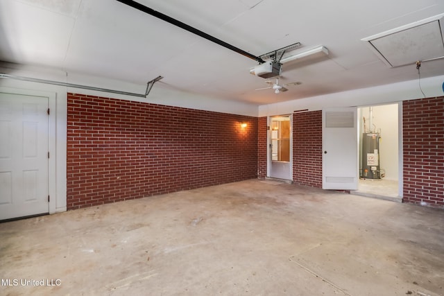 820 Lackland Dr, Biloxi, MS 39532 - garage featuring water heater and a garage door opener
