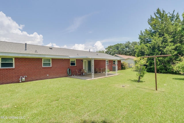 820 Lackland Dr, Biloxi, MS 39532 - view of grassy yard with a patio area and central air condition unit