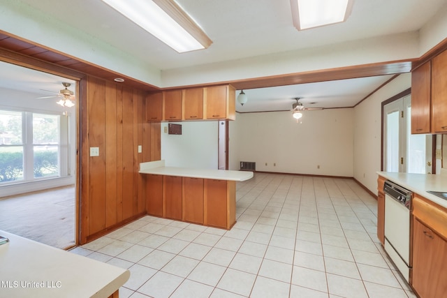 820 Lackland Dr, Biloxi, MS 39532 - kitchen with ceiling fan, dishwasher, light countertops, a peninsula, and baseboards