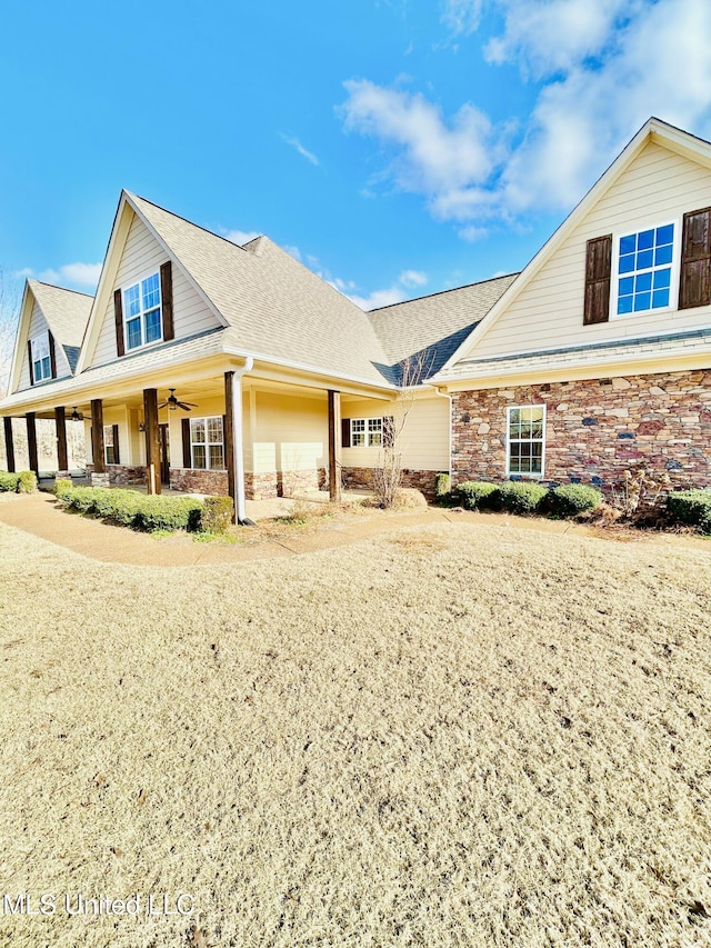 view of front of house with covered porch and ceiling fan