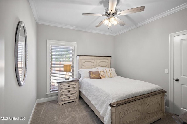 carpeted bedroom featuring ornamental molding and ceiling fan