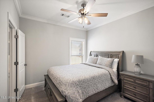 bedroom with dark colored carpet, ornamental molding, and ceiling fan