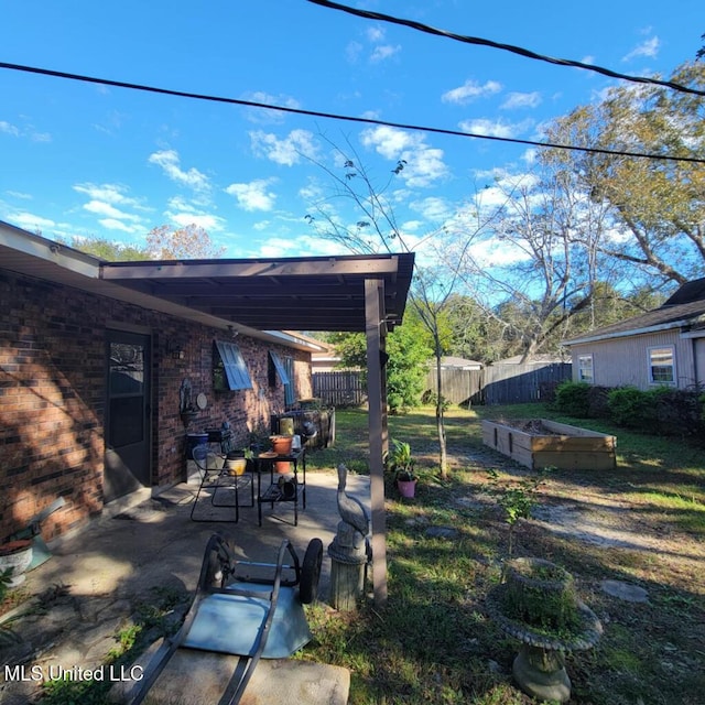 view of yard with a patio area