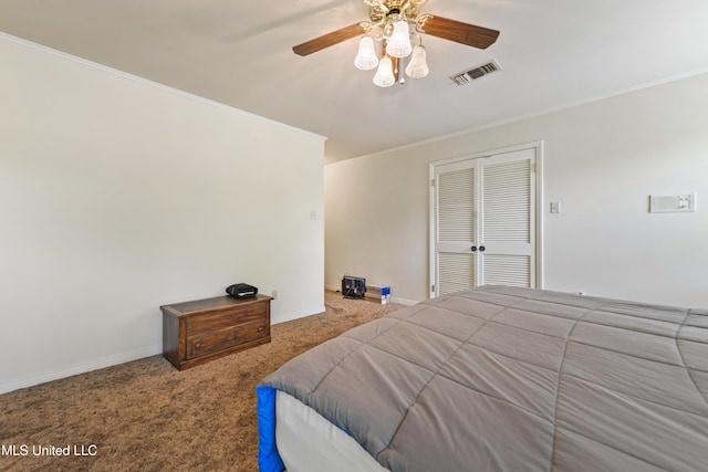 524 Champlin St, Gulfport, MS 39507 - carpeted bedroom with ornamental molding, a ceiling fan, baseboards, and a closet