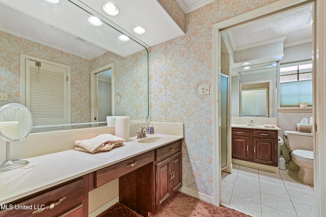 524 Champlin St, Gulfport, MS 39507 - full bathroom featuring toilet, vanity, ornamental molding, wallpapered walls, and a stall shower