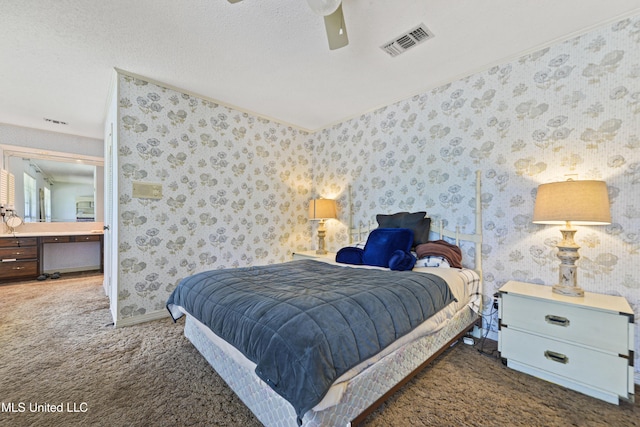 524 Champlin St, Gulfport, MS 39507 - bedroom with carpet flooring, baseboards, wallpapered walls, and ceiling fan