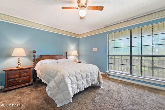 524 Champlin St, Gulfport, MS 39507 - carpeted bedroom featuring crown molding, a textured ceiling, baseboards, and ceiling fan