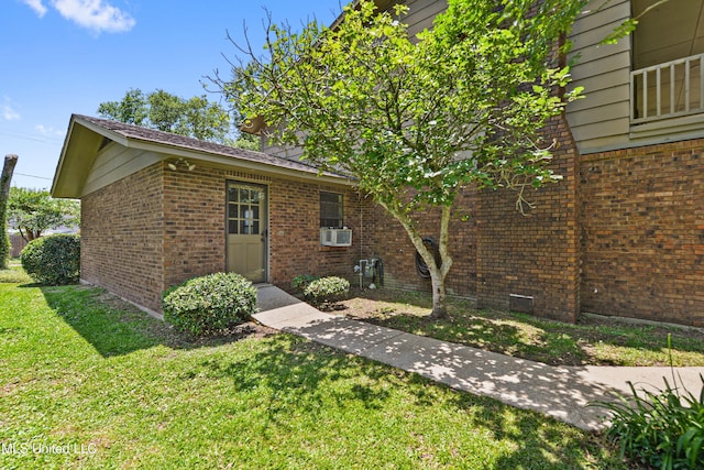 524 Champlin St, Gulfport, MS 39507 - view of front facade featuring a front yard and brick siding