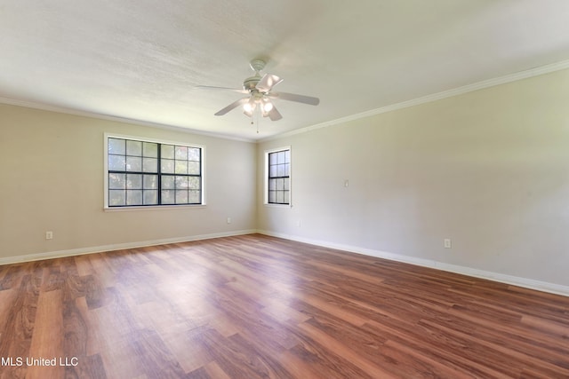524 Champlin St, Gulfport, MS 39507 - spare room featuring a ceiling fan, ornamental molding, wood finished floors, and baseboards