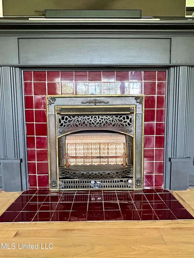 308 College St, Carthage, MS 39051 - details with a tiled fireplace