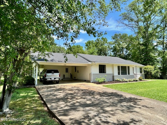 308 College St, Carthage, MS 39051 - ranch-style house with a carport, a front yard, and concrete driveway