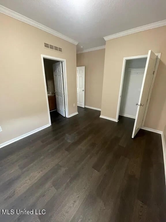 12205 Prudie Cir, Gulfport, MS 39503 - unfurnished room featuring baseboards, dark wood-type flooring, and ornamental molding
