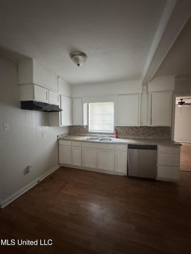941 Dorgan St, Jackson, MS 39204 - kitchen featuring dishwasher, dark wood-style flooring, white cabinets, under cabinet range hood, and backsplash