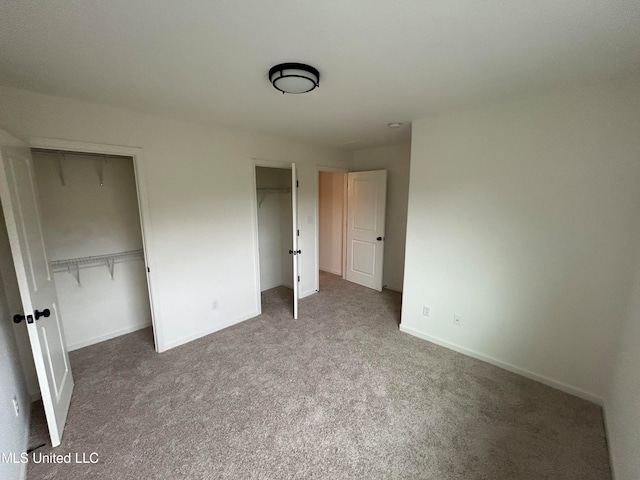 unfurnished bedroom featuring carpet flooring