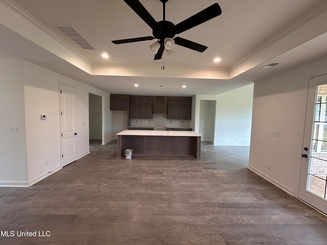 kitchen featuring crown molding, ceiling fan, and a healthy amount of sunlight