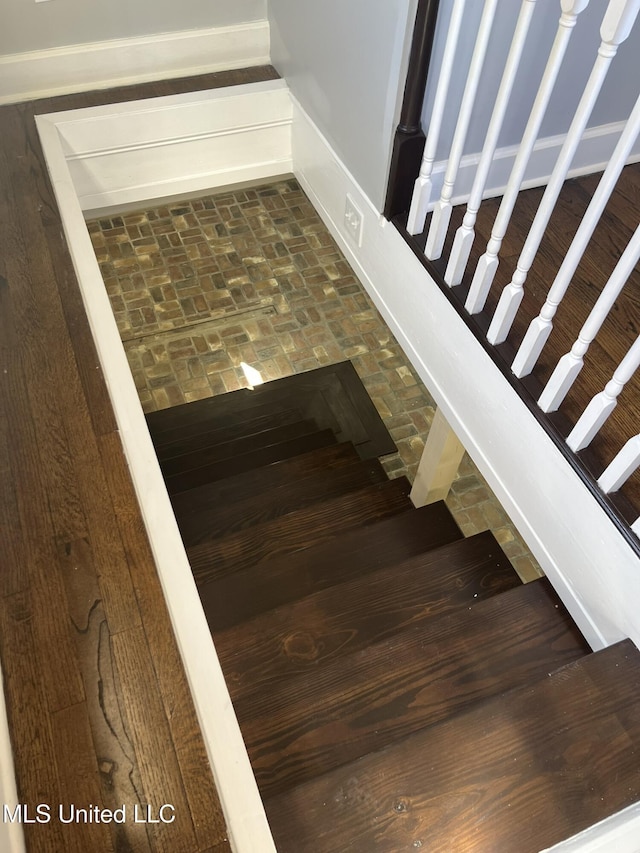 stairway with brick floor