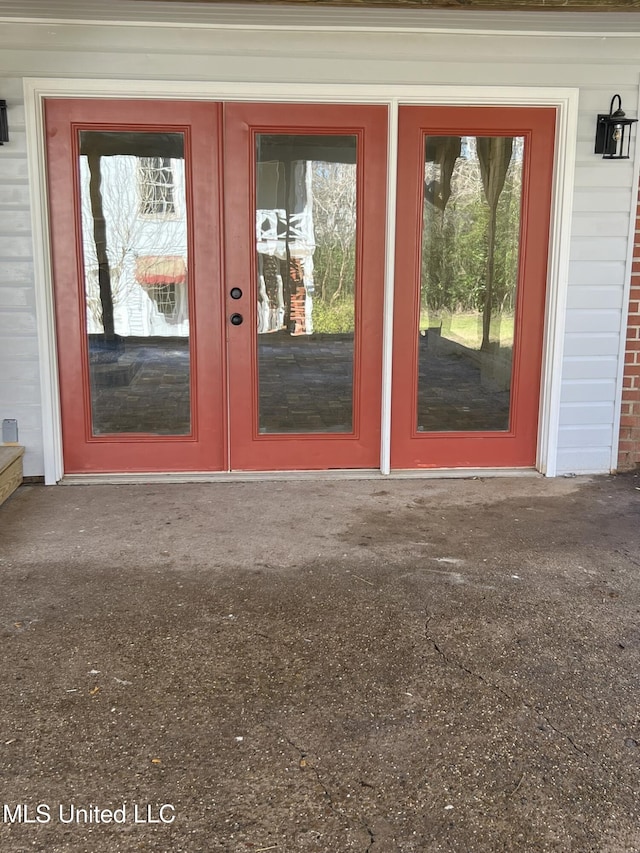 doorway to property featuring french doors