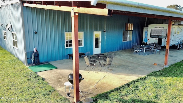 back of house featuring a patio