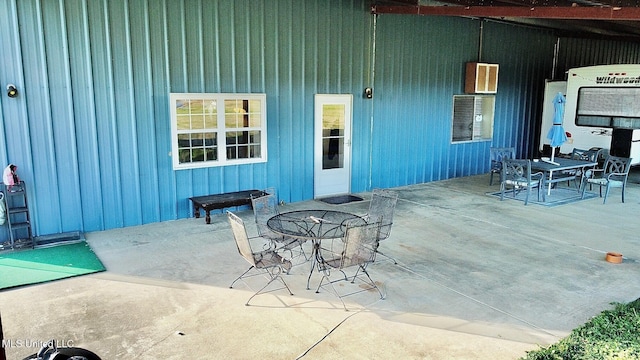 view of patio featuring outdoor dining space