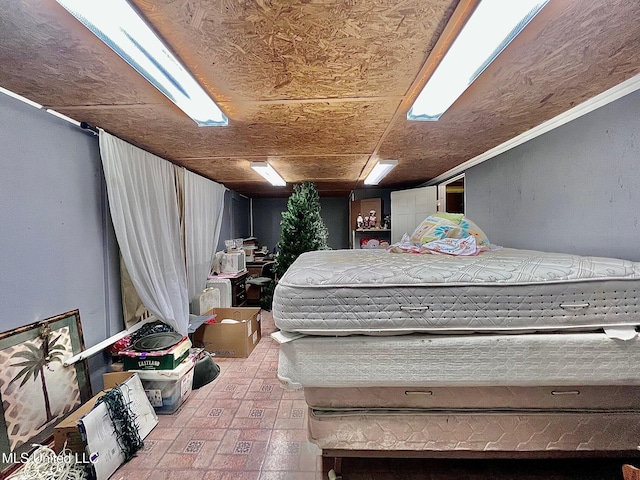 bedroom with brick floor