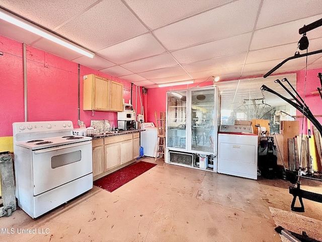 kitchen with concrete flooring, washer / clothes dryer, a drop ceiling, and electric range