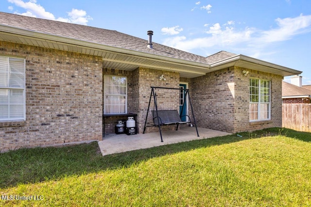 10840 Ala Moana St, Diamondhead, MS 39525 - back of house with brick siding and a patio area