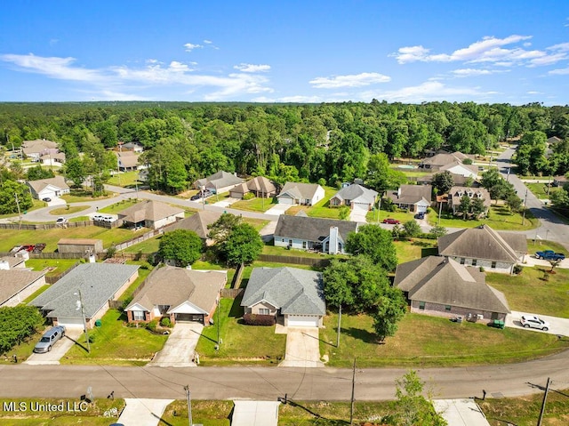 10840 Ala Moana St, Diamondhead, MS 39525 - aerial perspective of suburban area with a heavily wooded area