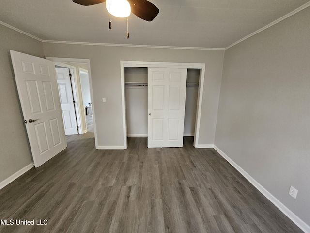 unfurnished bedroom featuring ceiling fan, baseboards, a closet, ornamental molding, and dark wood-type flooring