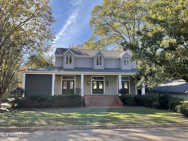 view of front of home featuring a front lawn