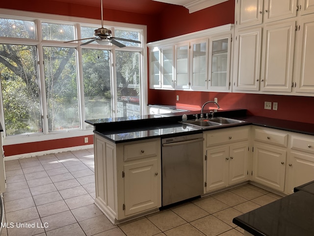 kitchen with ceiling fan, dishwasher, light tile patterned floors, and sink