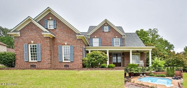 2948 Grove Meadows Dr, Nesbit, MS 38651 - view of front of house with a front lawn and brick siding