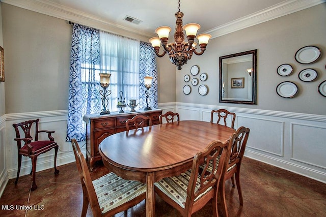2948 Grove Meadows Dr, Nesbit, MS 38651 - dining area with a chandelier, crown molding, a wainscoted wall, and a decorative wall