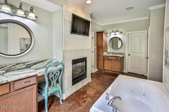 2948 Grove Meadows Dr, Nesbit, MS 38651 - bathroom with finished concrete flooring, a whirlpool tub, crown molding, a fireplace, and vanity