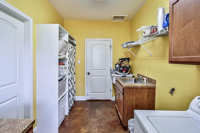 2948 Grove Meadows Dr, Nesbit, MS 38651 - laundry area featuring washer / clothes dryer, cabinet space, and baseboards