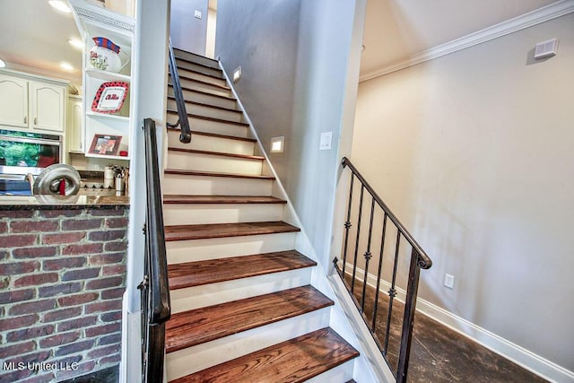 2948 Grove Meadows Dr, Nesbit, MS 38651 - stairway with crown molding and baseboards