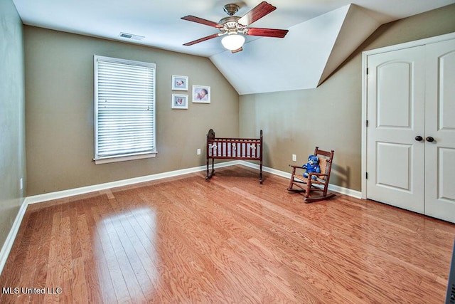 2948 Grove Meadows Dr, Nesbit, MS 38651 - bedroom with light wood-style floors, vaulted ceiling, baseboards, and ceiling fan
