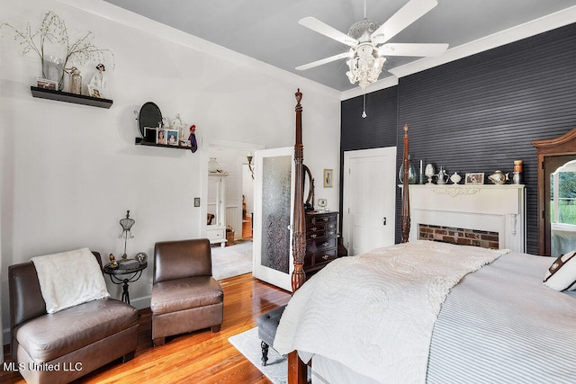 bedroom featuring wood-type flooring and ceiling fan