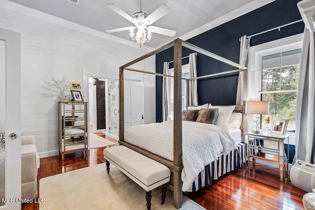 bedroom with hardwood / wood-style floors and ceiling fan