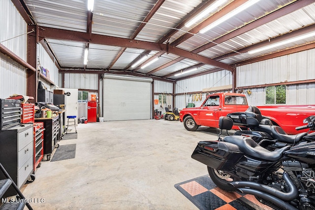 garage featuring a carport