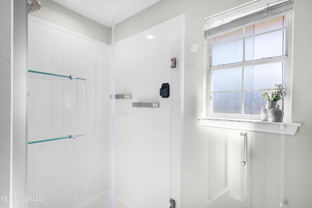 bathroom with an enclosed shower