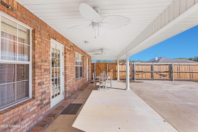 view of patio featuring french doors and ceiling fan