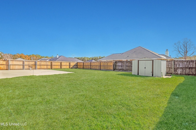 view of yard with a storage shed