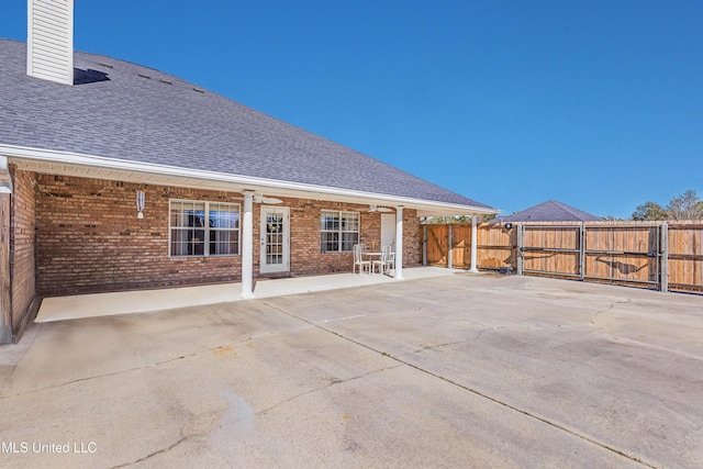 rear view of property featuring a patio