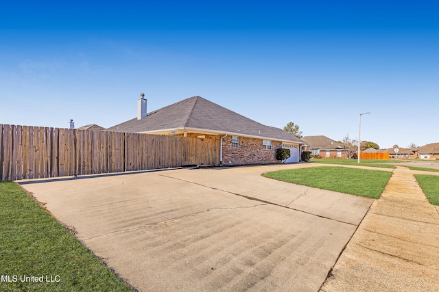 view of home's exterior featuring a lawn