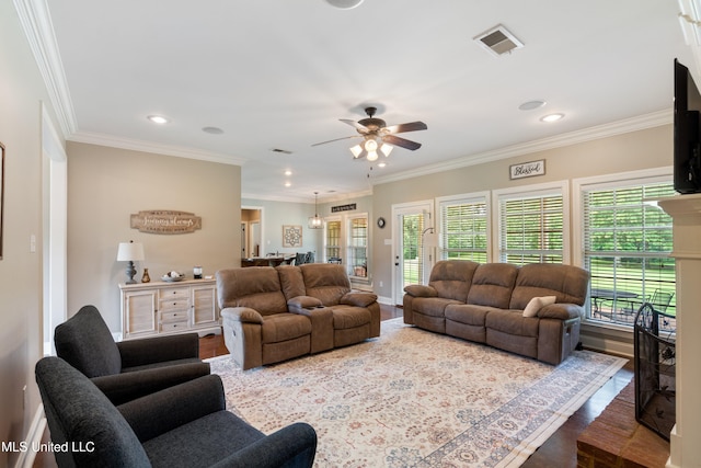 7247 Eastern Rd, Olive Branch, MS 38654 - living room with dark wood finished floors, ceiling fan, recessed lighting, and ornamental molding