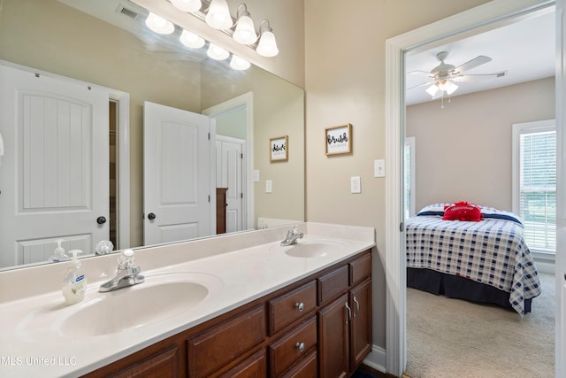 7247 Eastern Rd, Olive Branch, MS 38654 - full bathroom featuring ensuite bath, double vanity, and a ceiling fan