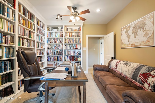 7247 Eastern Rd, Olive Branch, MS 38654 - carpeted home office with ceiling fan, wall of books, and built in features